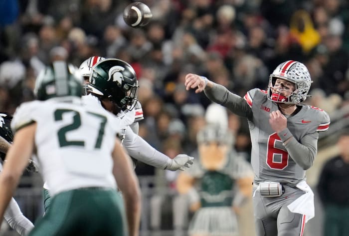 Ohio State quarterback Kyle McCord throws a pass at Ohio State against Michigan State.